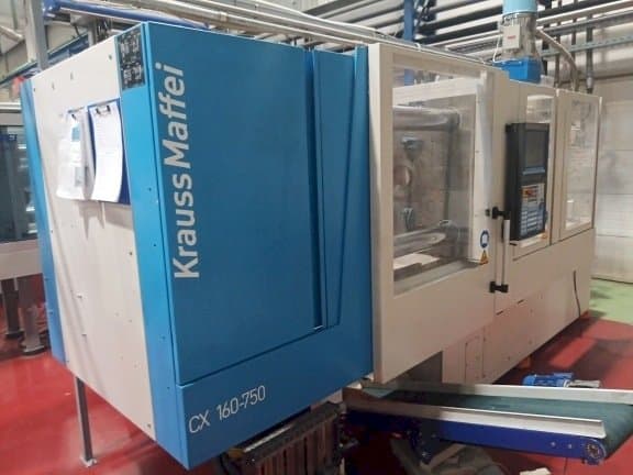 Vista frontale della macchina Krauss Maffei KM 160-750 CX