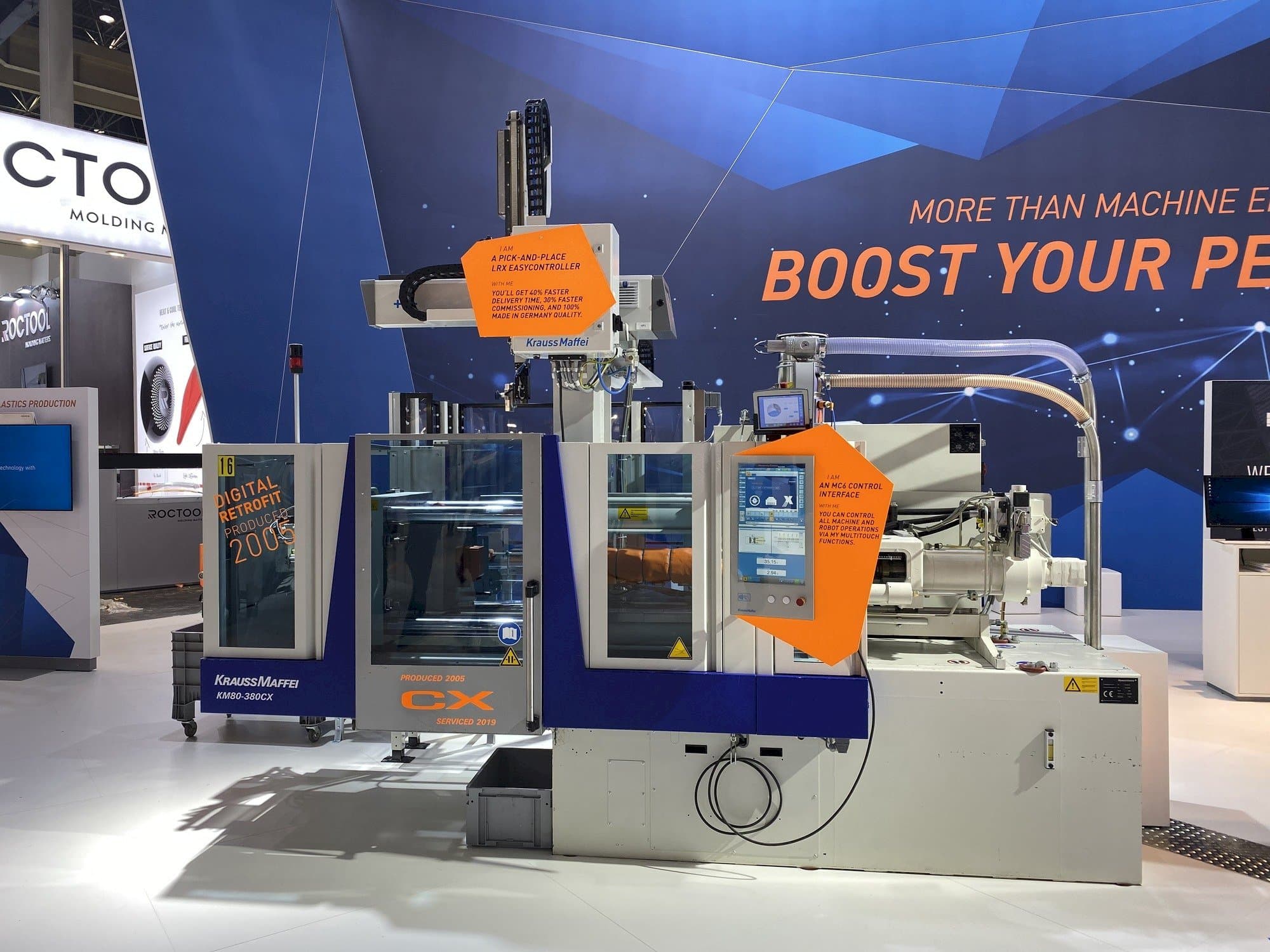 Vista frontale della macchina Krauss Maffei 80-380 CX + LRX easyControl 100