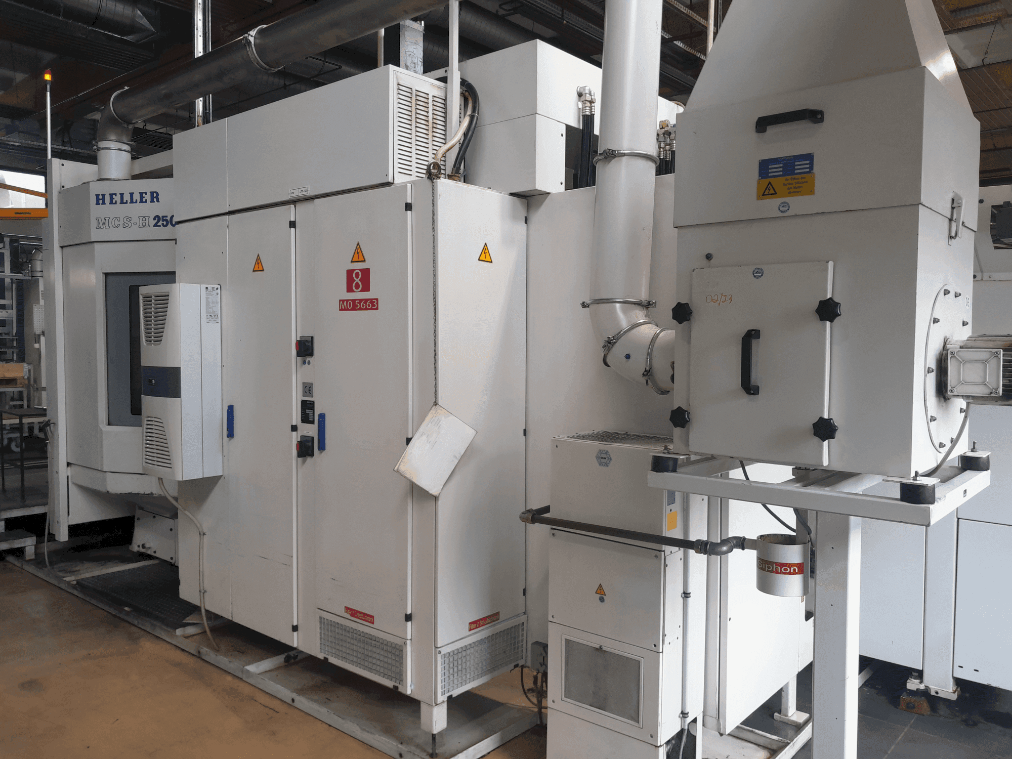 Vista frontale della macchina HELLER MCS-H 250