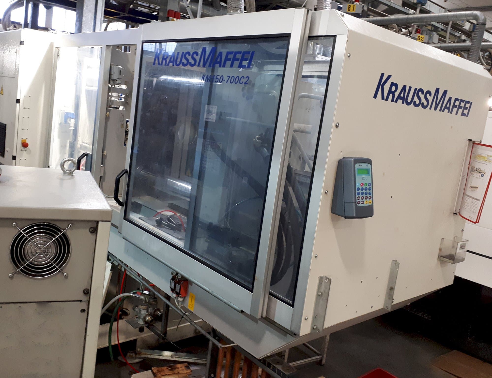 Vista lato destro della macchina Krauss Maffei C2 150-700