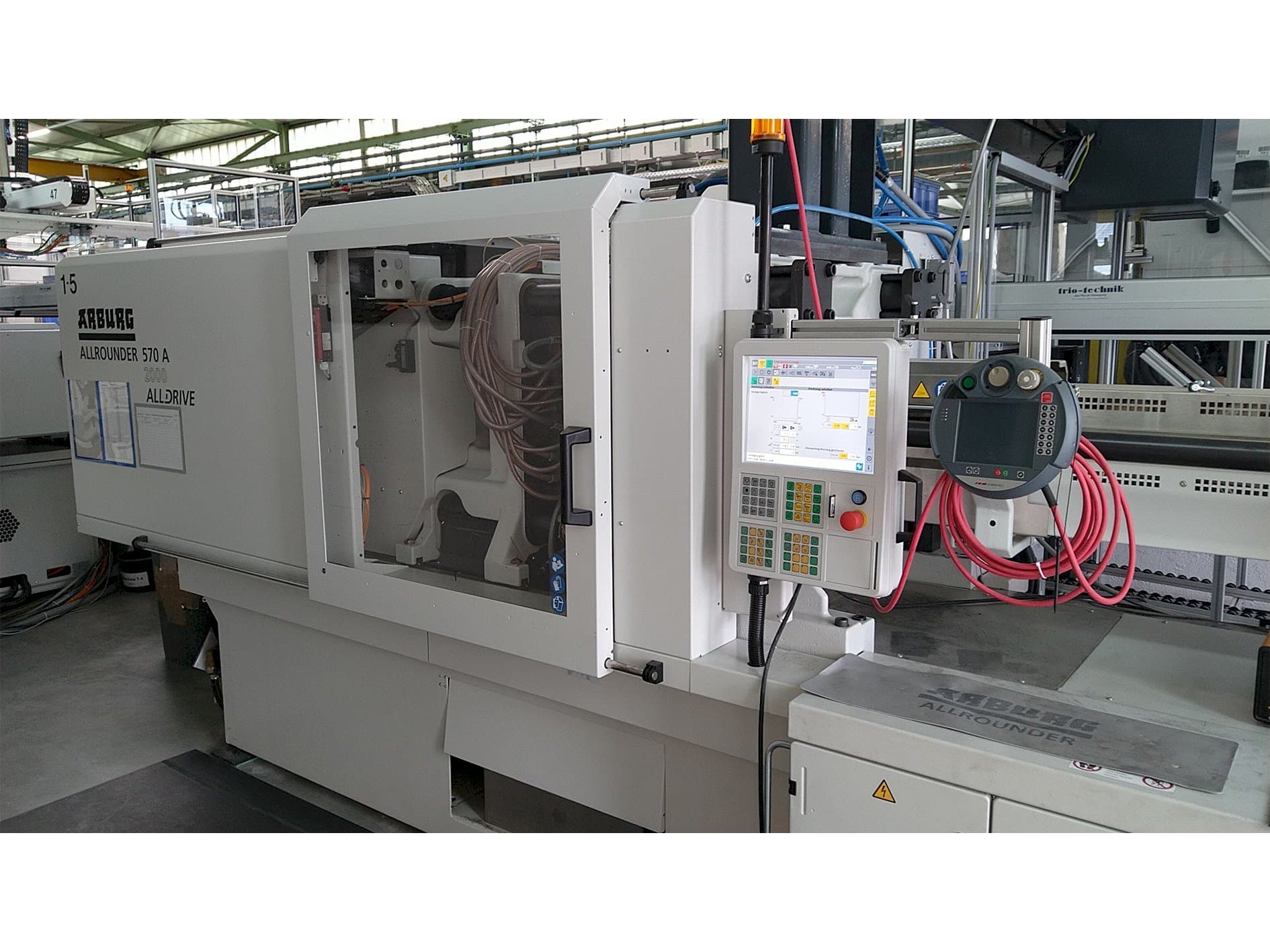 Vista frontale della macchina Arburg Allrounder 570 A 2000-800 ALLDRIVE