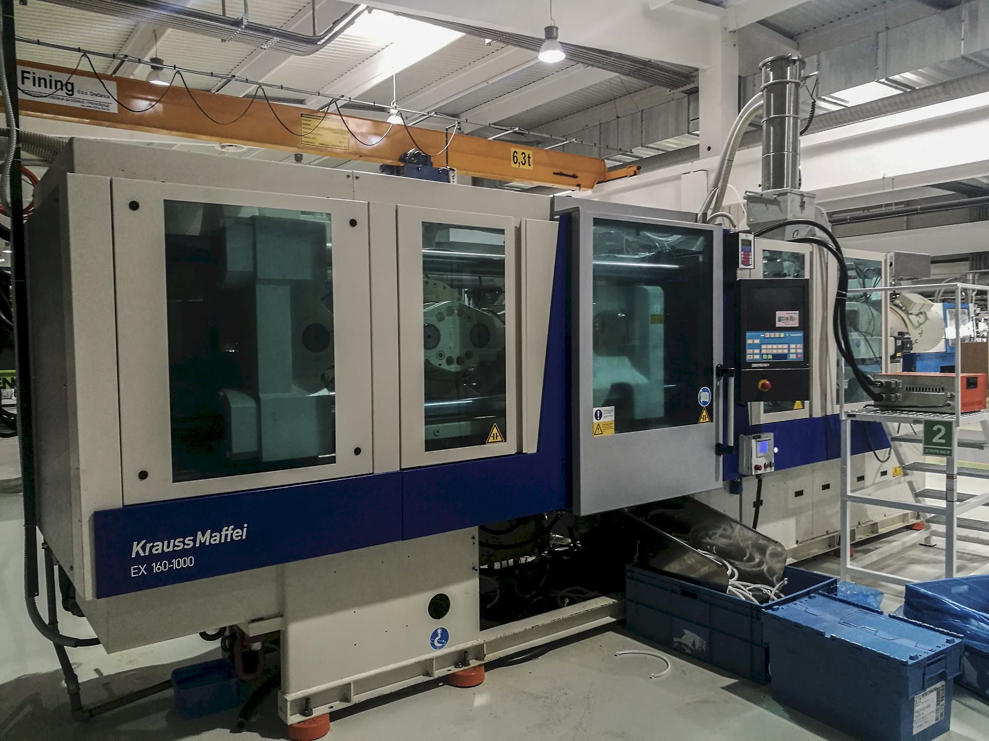 Vista lato sinistro della macchina Krauss Maffei 160-1000 EX