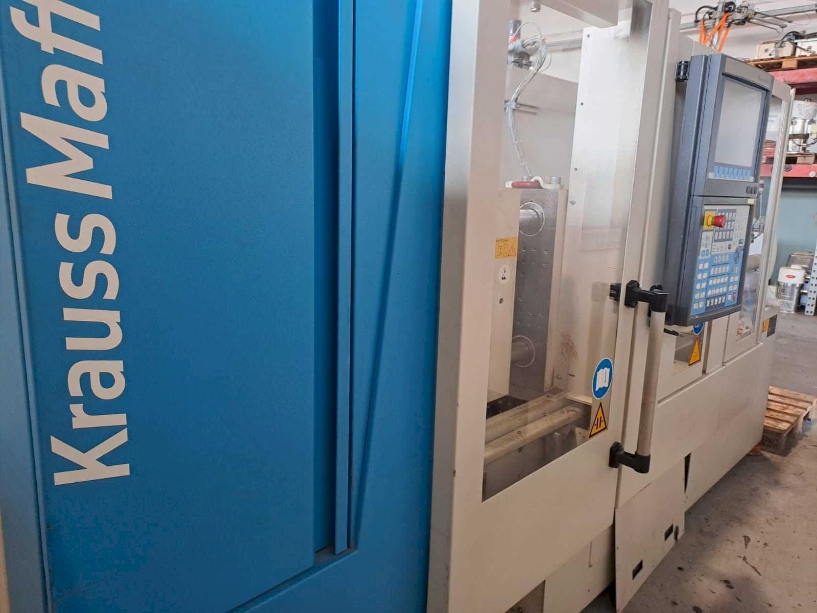 Vista frontale della macchina Krauss Maffei 35-180CX