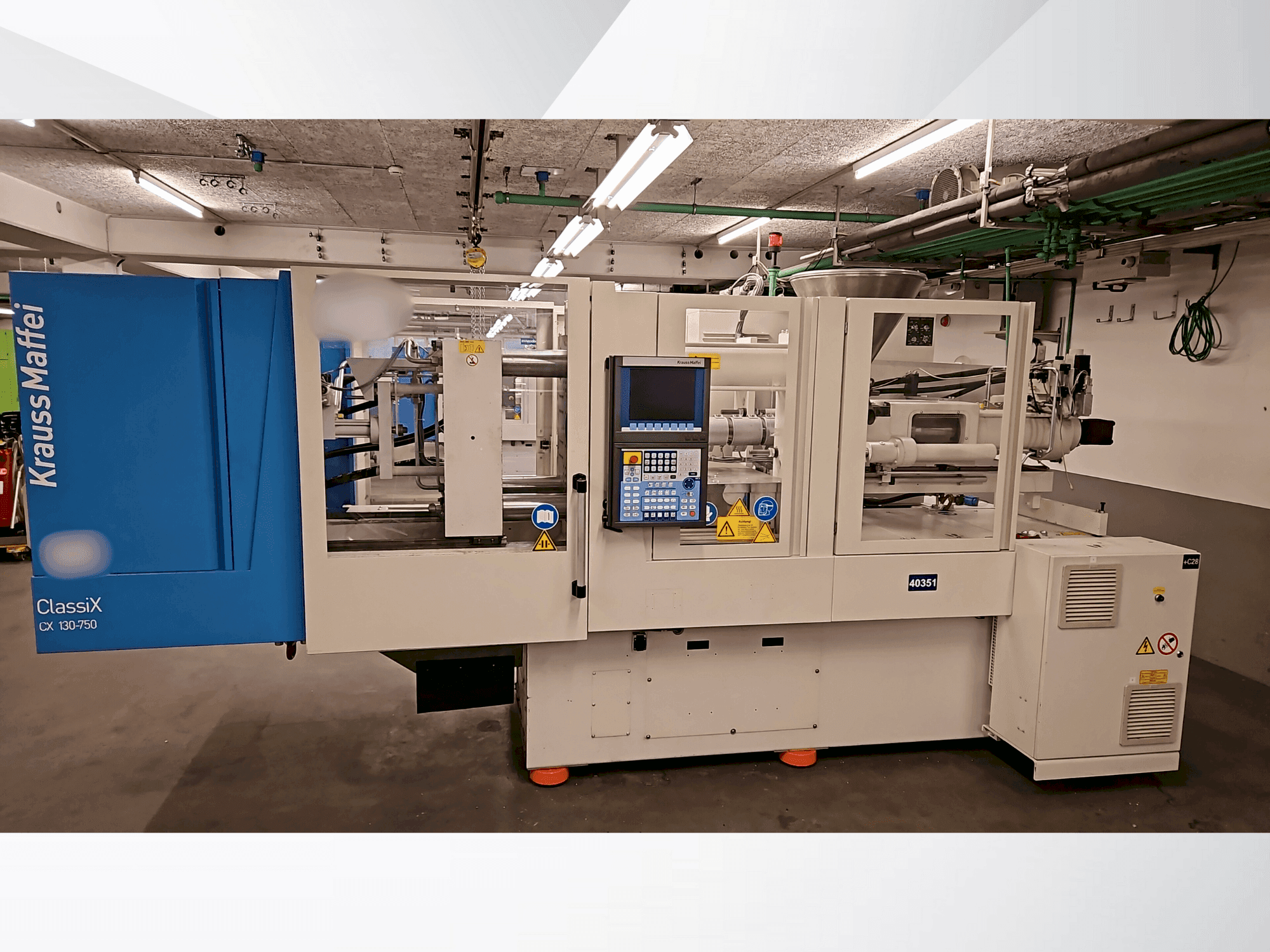 Vista frontale della macchina Krauss Maffei 130-750 CX