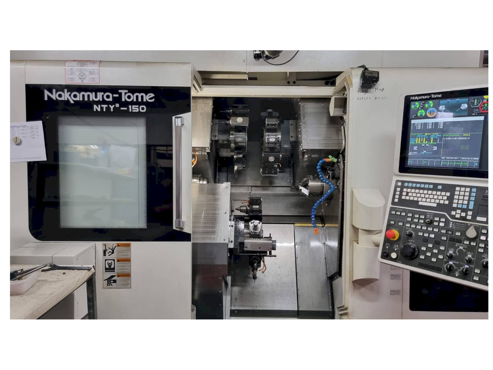 Vista frontale della macchina NAKAMURA-TOME NTY3-150