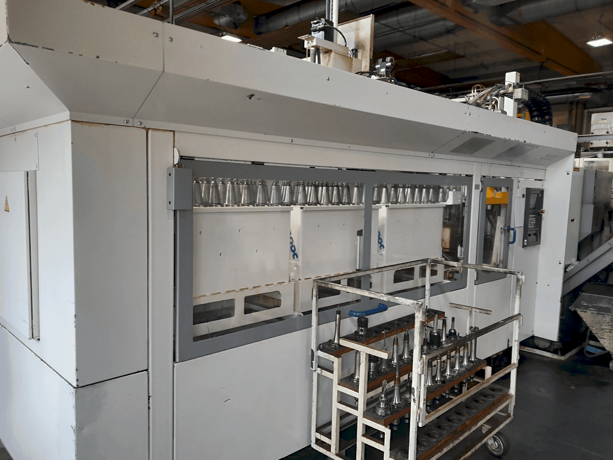 Vista laterale della macchina HELLER MCS-H 250