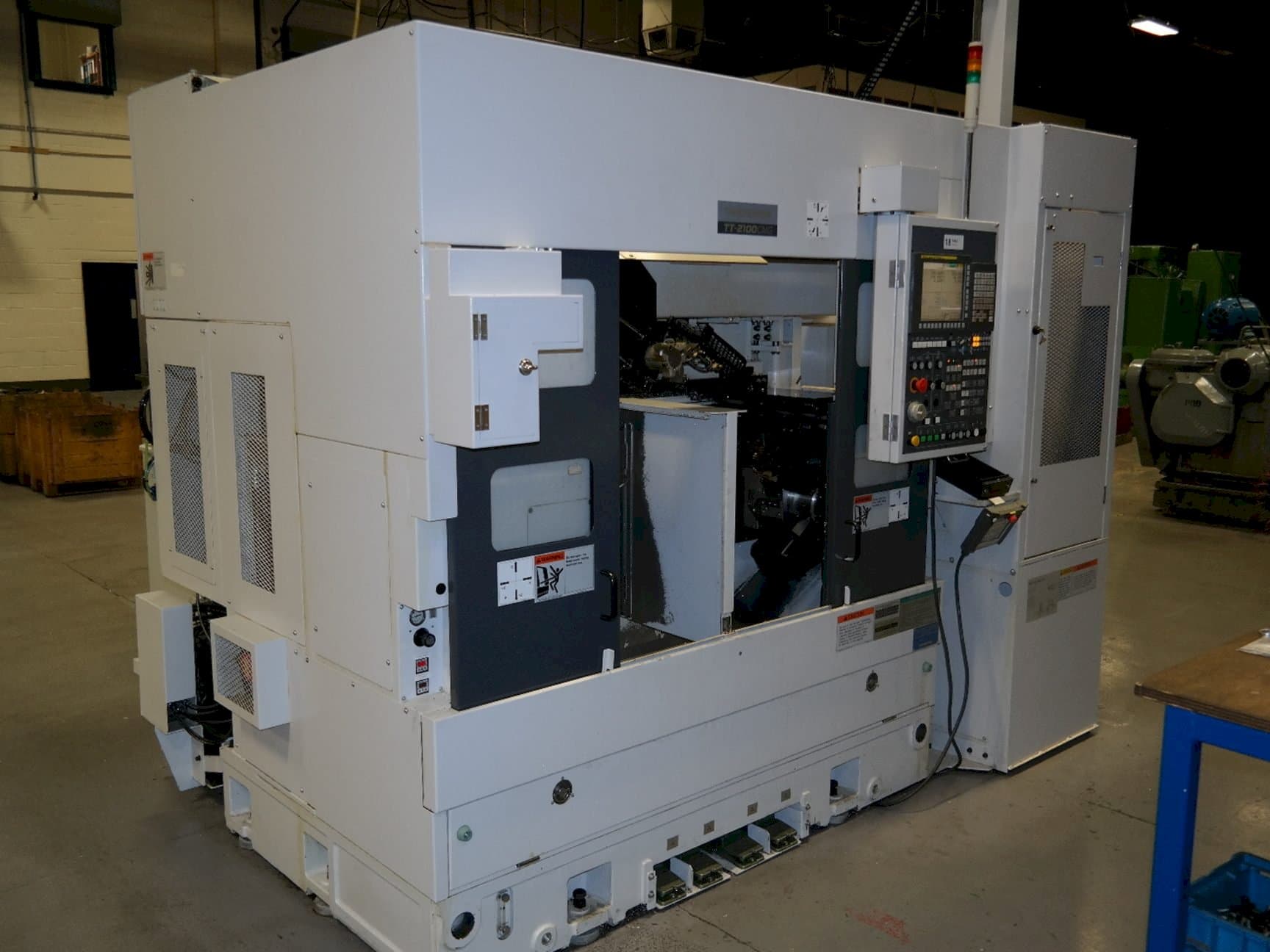 Vista frontale della macchina Takisawa TT2100CMGA