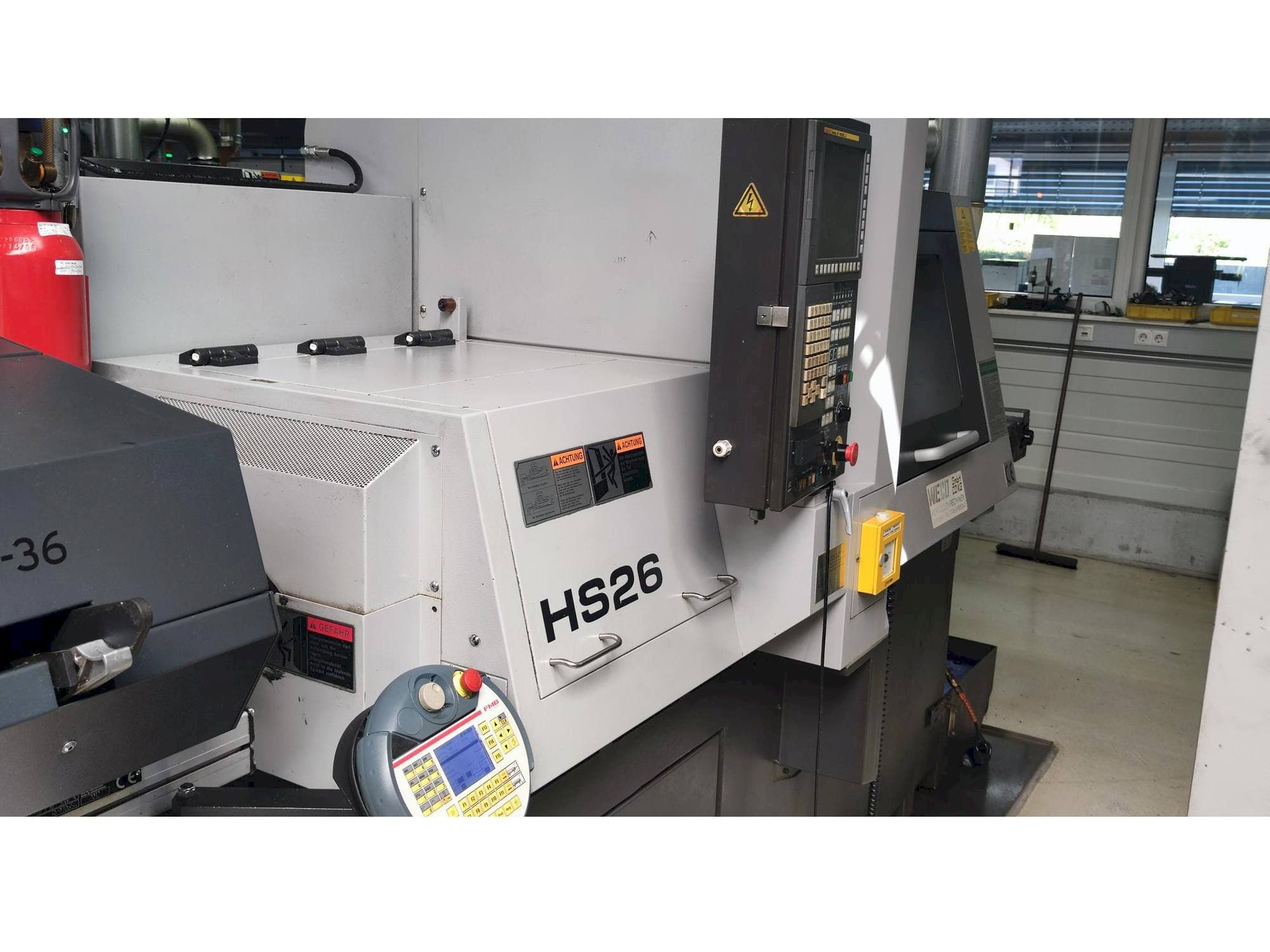 Vista laterale sinistra della macchina TSUGAMI HS26