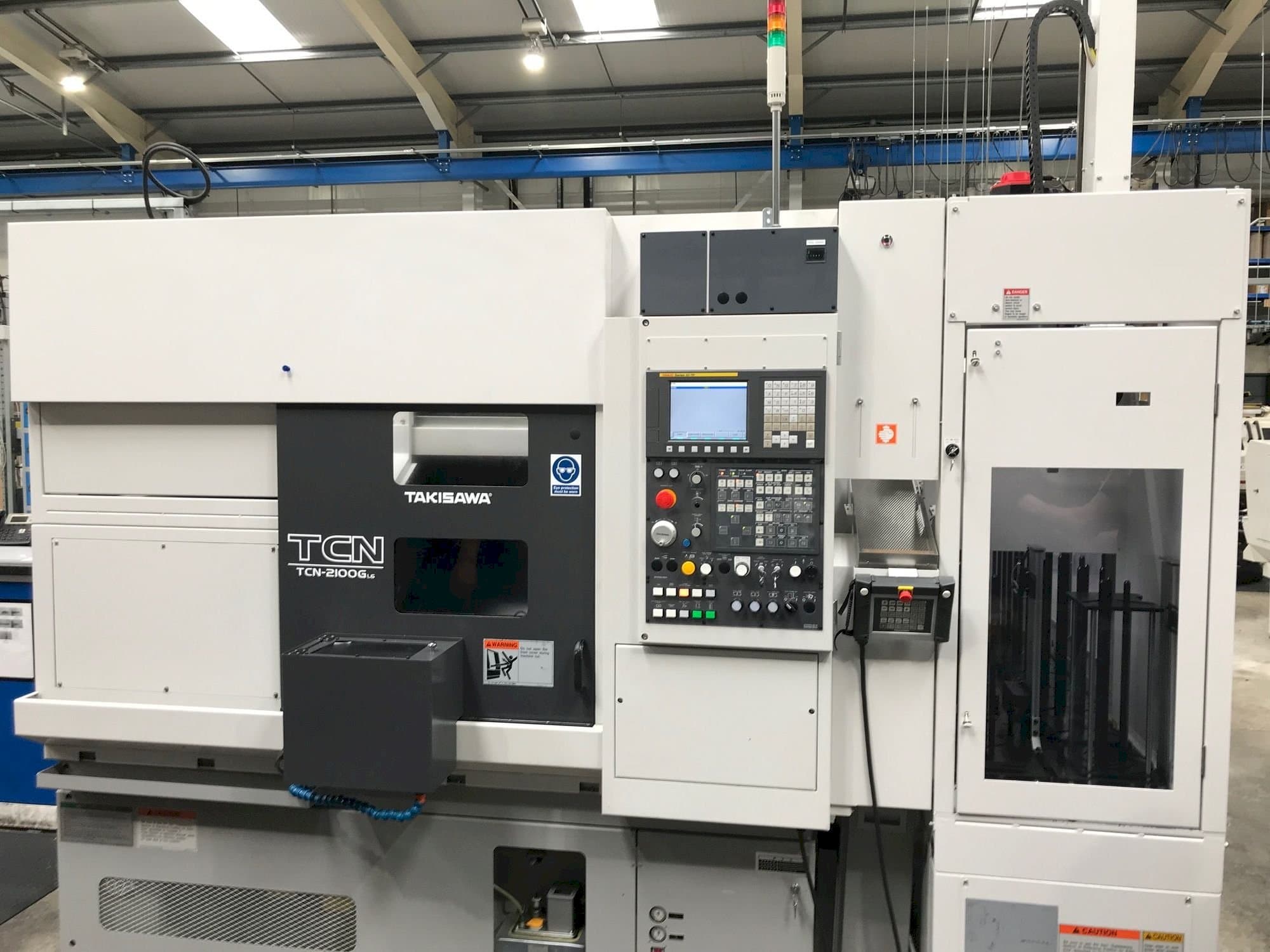 Vista frontale della macchina Takisawa TCN-2100G L6