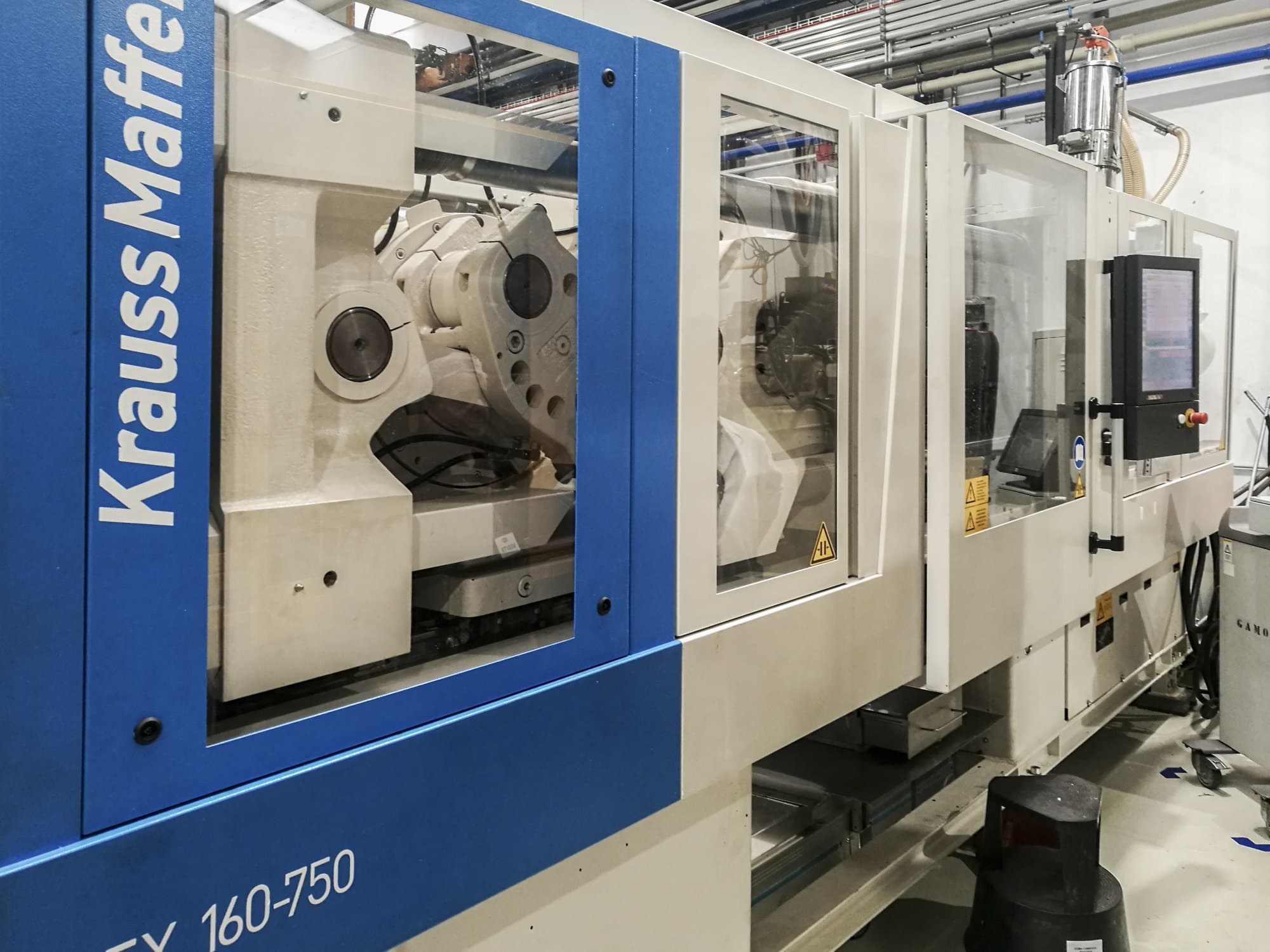Vista lato sinistro della macchina Krauss Maffei 160-750 EX