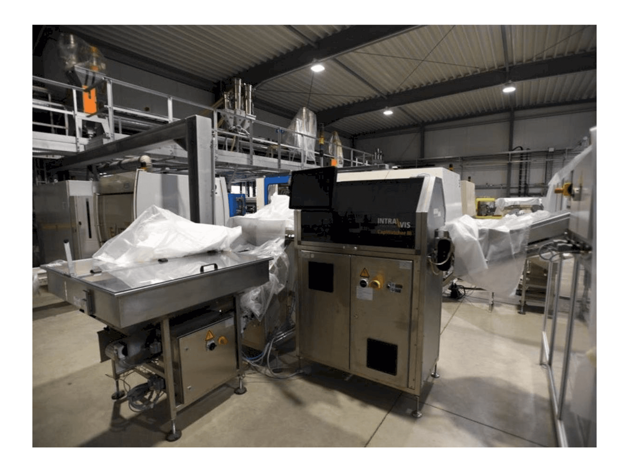 Vista frontale della macchina INTRAVIS Capwatcher 6275