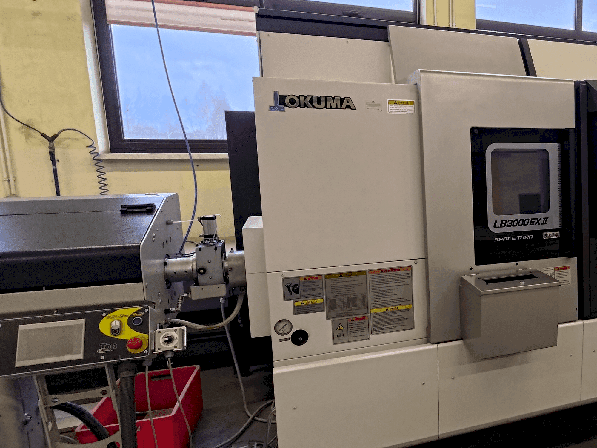 Vista frontale della macchina Okuma LB 3000 EXII MYW 450