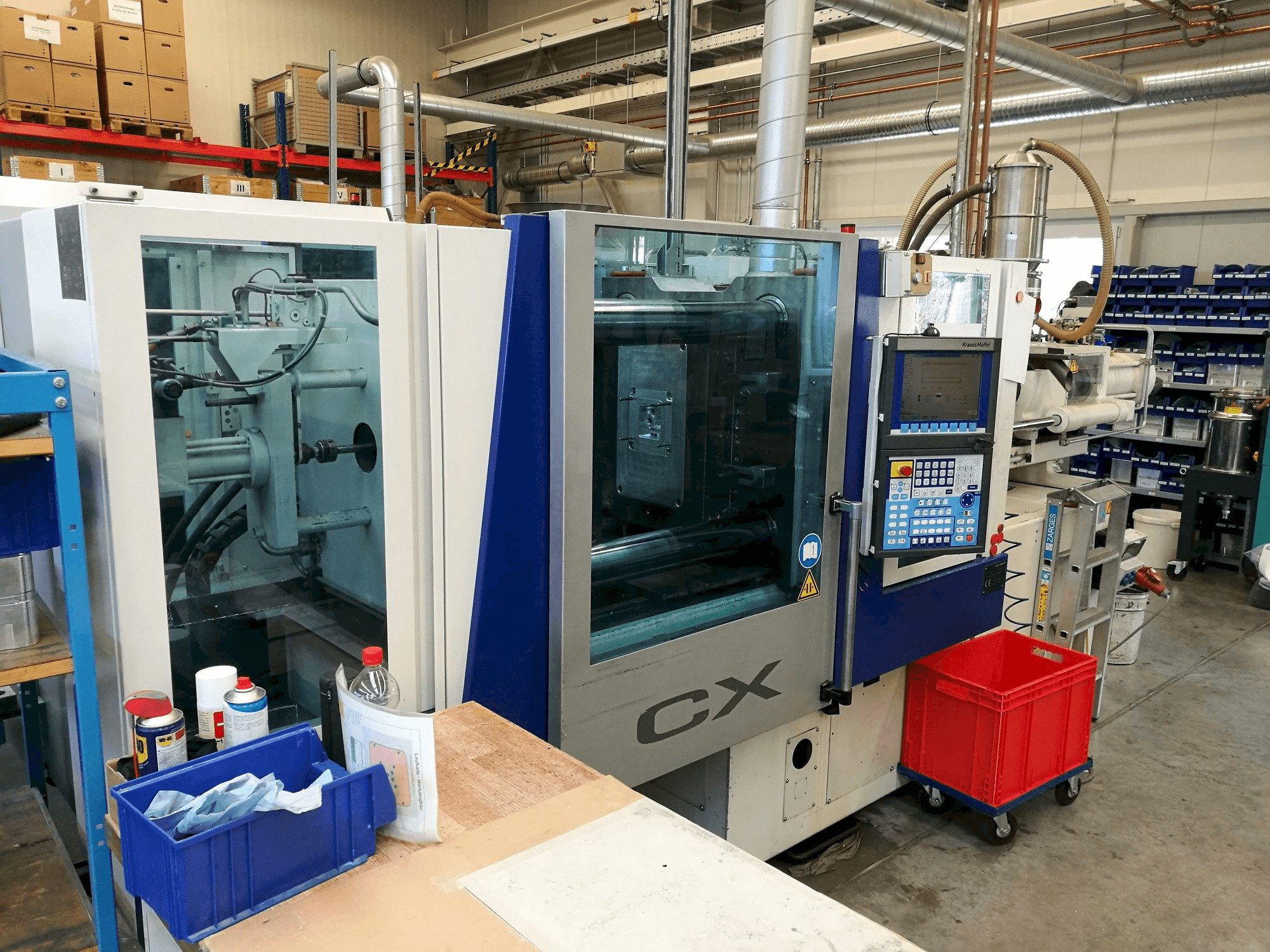 Vista frontale della macchina Krauss Maffei 160-1000 CX